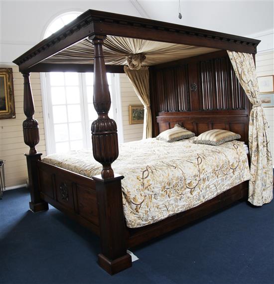 A 17th century style carved oak four poster bed, W. 7ft. L. 7ft 6in. H. 6ft 6in.